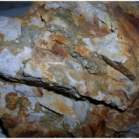 Art prospect: pyrite +/- arsenopyrite in felsic schist to 1.5 g/t gold